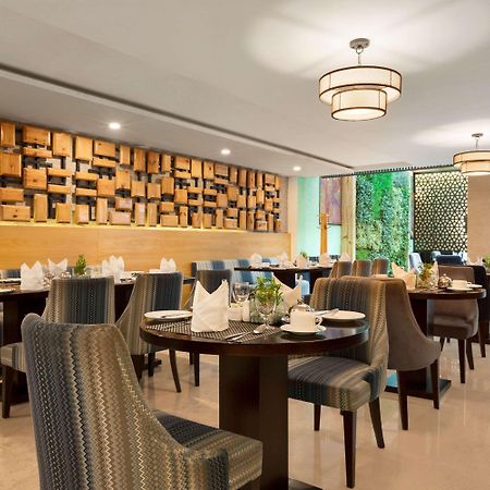 Отель Ramada Dehradun Chakrata Road Экстерьер фото
