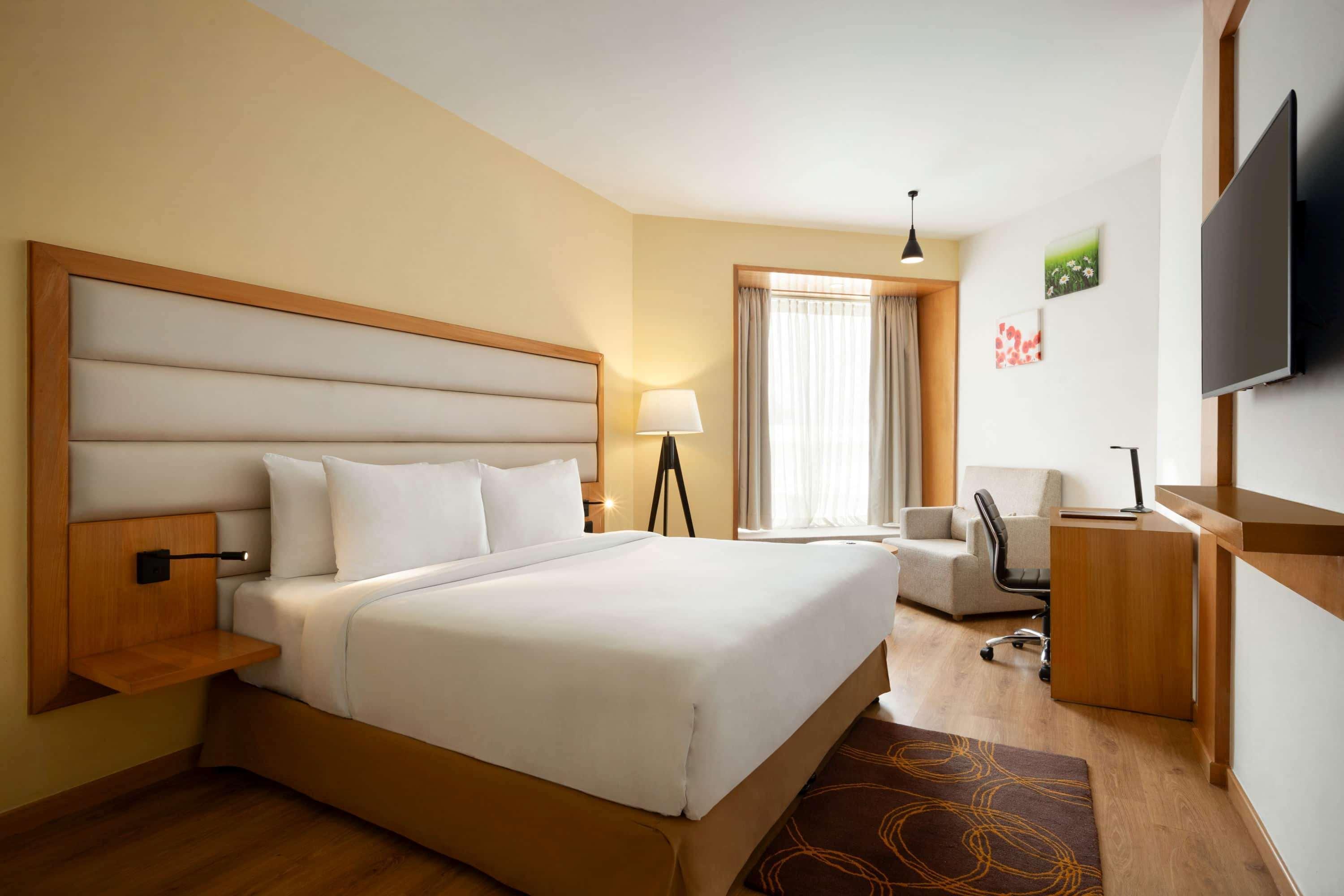 Отель Ramada Dehradun Chakrata Road Экстерьер фото