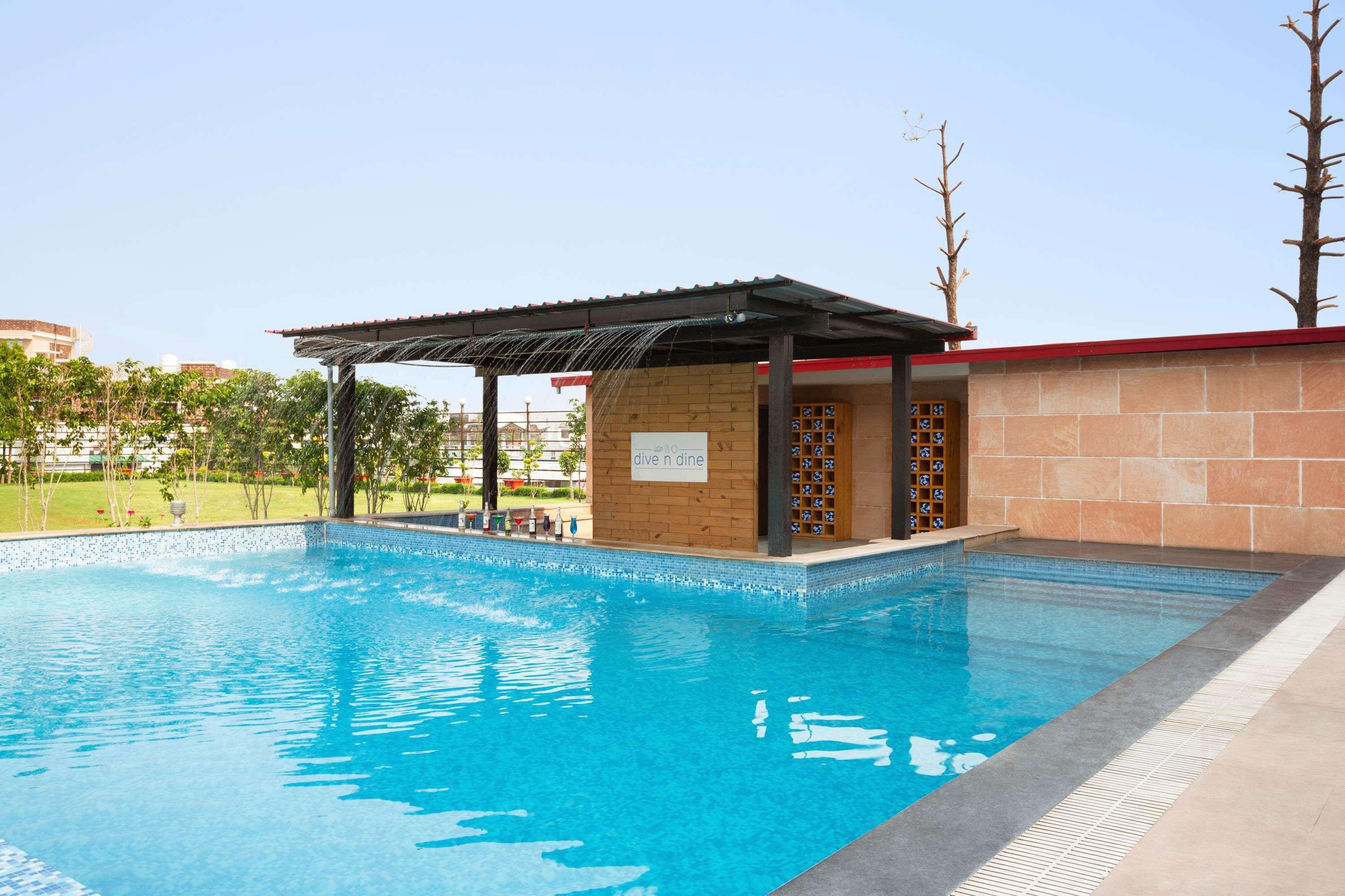 Отель Ramada Dehradun Chakrata Road Экстерьер фото