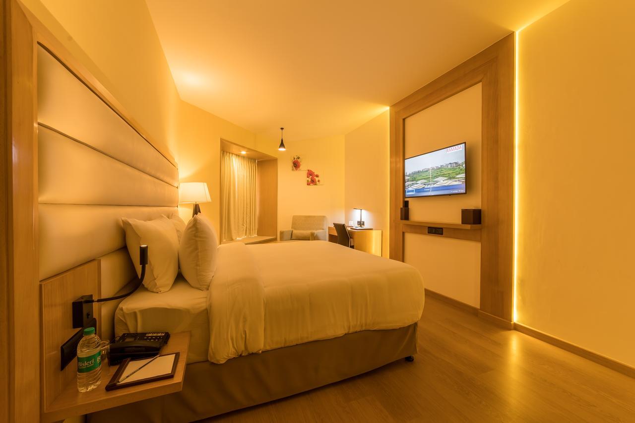 Отель Ramada Dehradun Chakrata Road Экстерьер фото